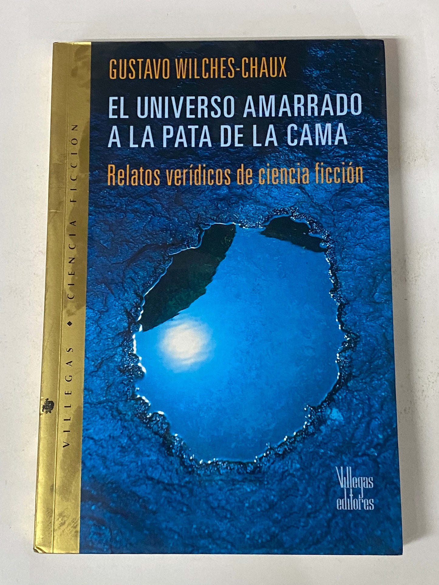 EL UNIVERSO AMARRADO A LA PATA DE LA CAMA- GUSTAVO WILCHES-CHAUX